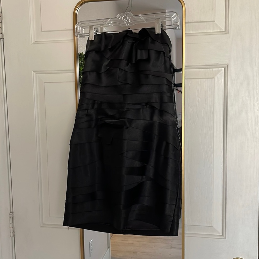 Black strapless Medium Bebe dress.